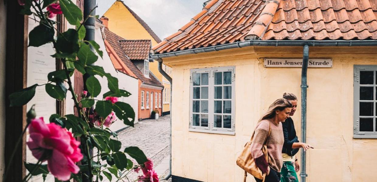 Women walking in old town of Odense on Fyn