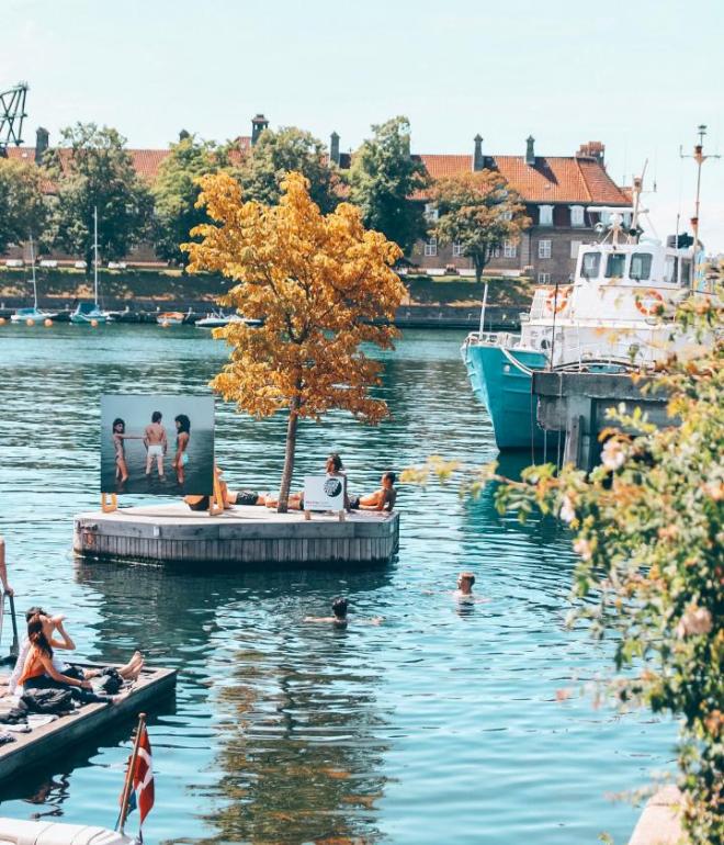 People enjoy the water around La Banchina in summer