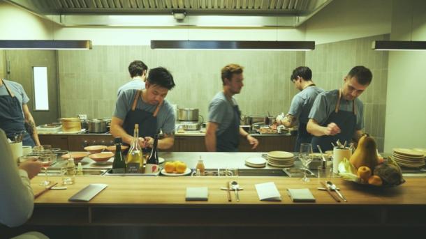 Chef plating at michelin star restaurant Jatak in Copenhagen