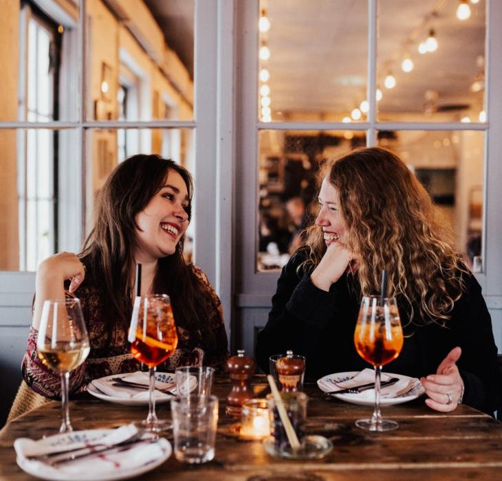 Two women eating dinner at Undici, a restaurant in the neighbourhood Christianshavn in Copenhagen, Denmark