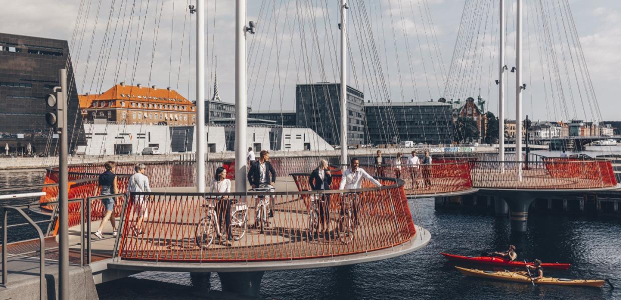 Business people with bikes on the circle bridge in Copenhagen