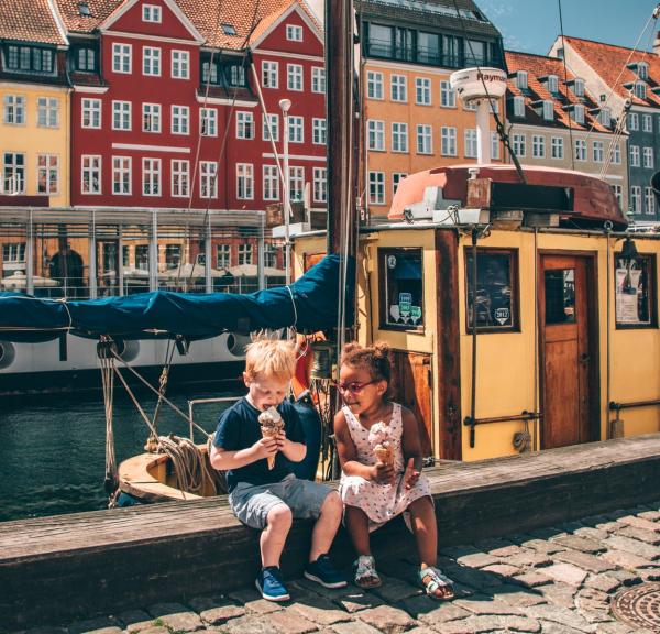 Kids eating ice cream in Copenhagen's iconic Nyhavn