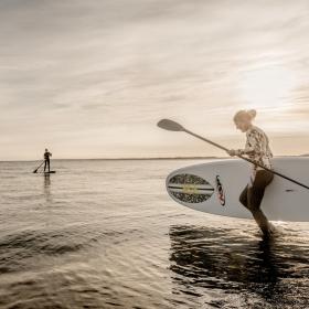 Two people standup paddling in Klitmøller, North Jutland