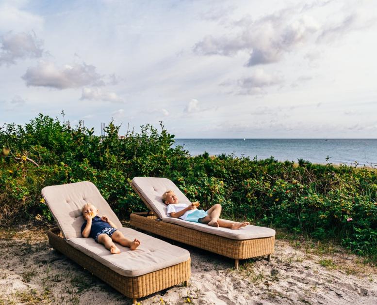 Children relax on the beach in Grenaa, East Jutland