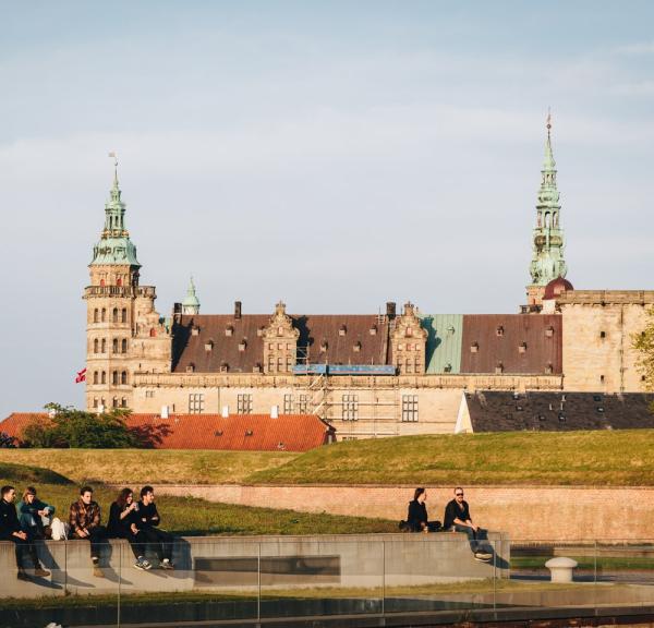 People hanging out in front of Kronborg Castle in Helsingør