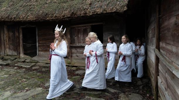 Santa Lucia parade in the Open Air Museum in Kongens Lyngby, near Copenhagen