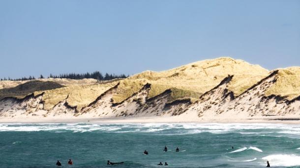 People surfing at the bay of Vorupør, Denmark