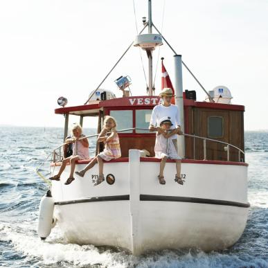 Familje på Postbåden i Nakskov Fjord