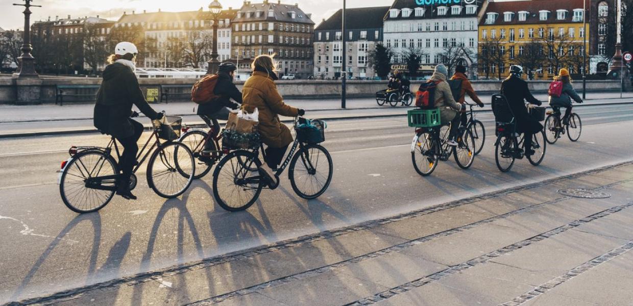 People cycling on Queen Louise's Bridge in winter, Copenhagen