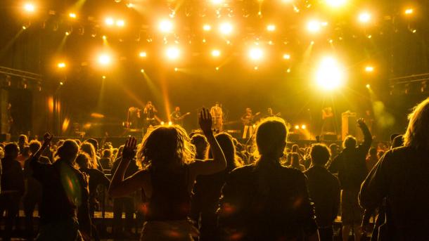 A crowd enjoys a concert at Roskilde Festival in Denmark