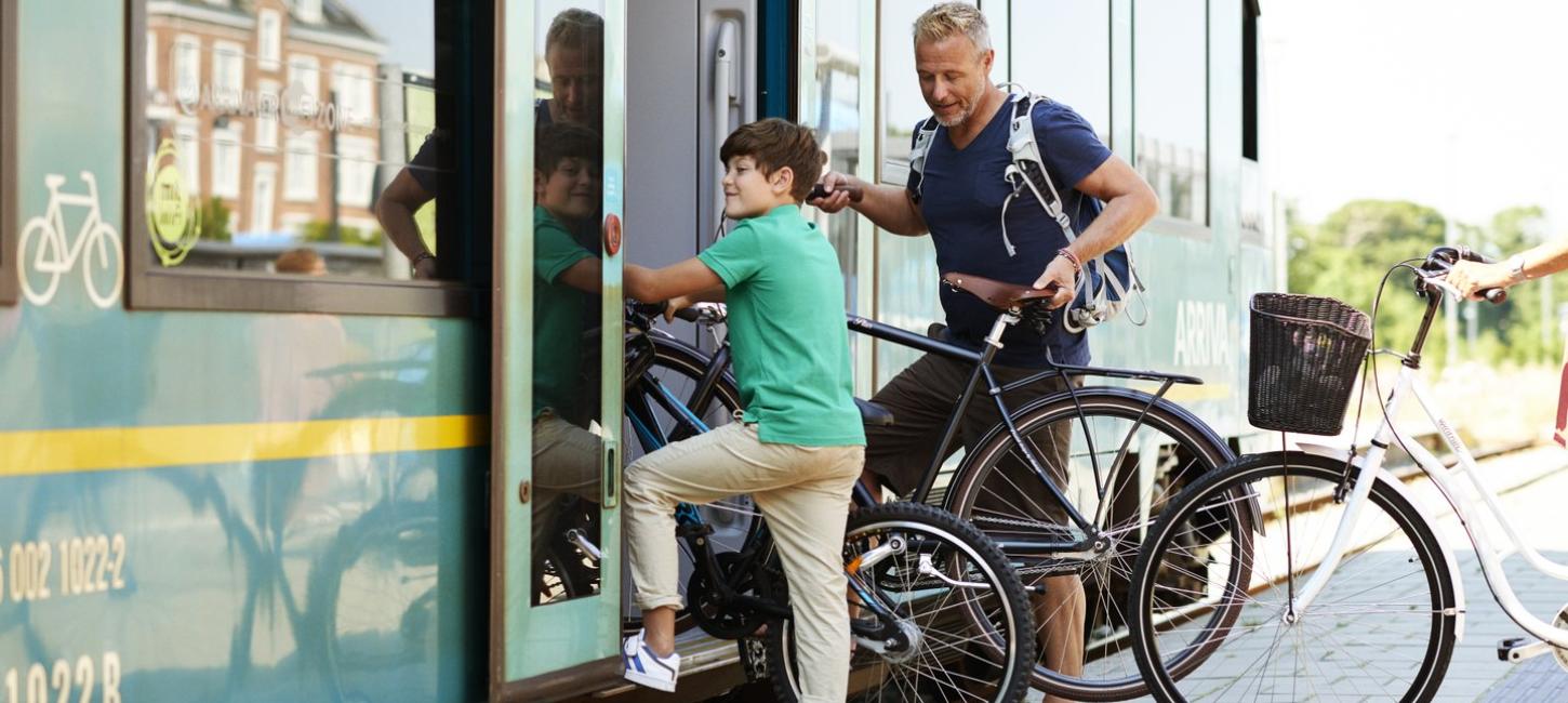 Family with bike in the train, Thisted