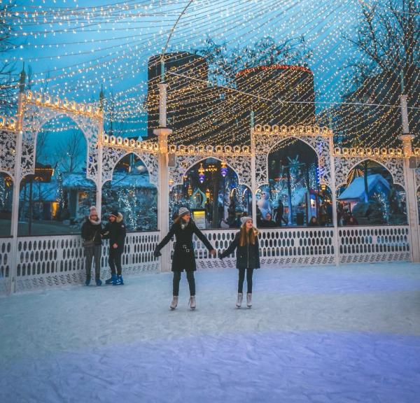 Ice skating in front of the magical Nimb Hotel in the iconic Tivoli Gardens